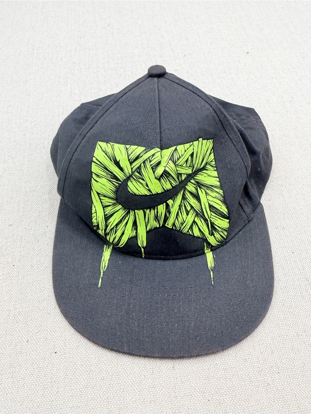 Nike Kids Black Cap with Neon Green Graphic